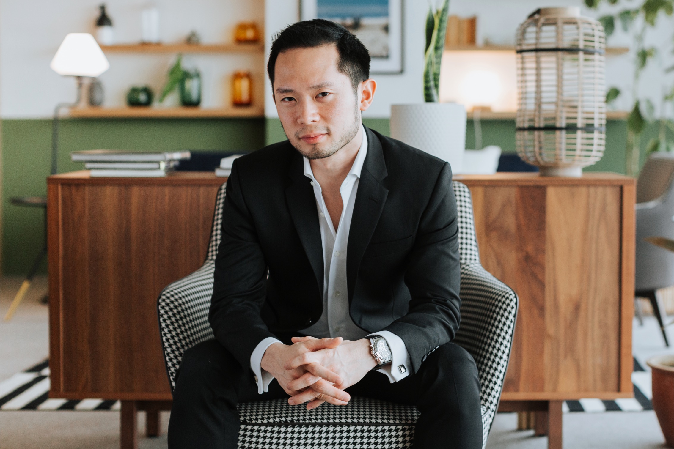 Chan Eu Boon, CEO of Sugarbook, seated in a confident branding portrait.