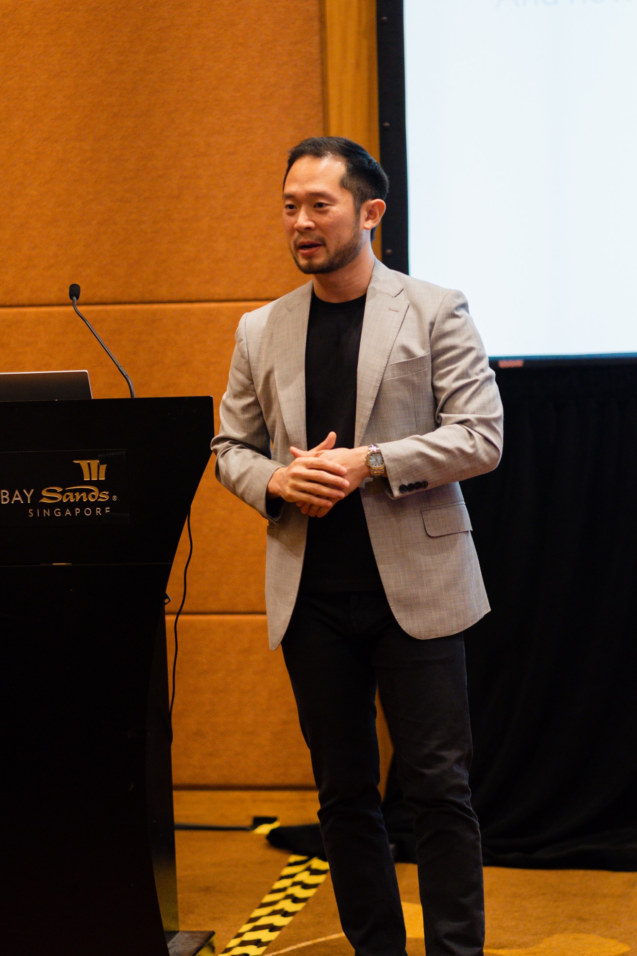 Chan Eu Boon (Darren), CEO of Sugarbook, speaking at the GDI Singapore conference.