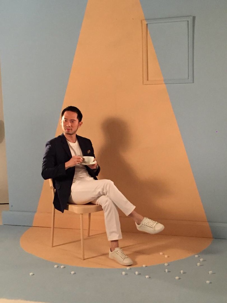 Chan Eu Boon – Editorial CEO Portrait - Chan Eu Boon (Darren) Editorial photo of Chan Eu Boon, CEO of Sugarbook, seated with tea under a spotlight.