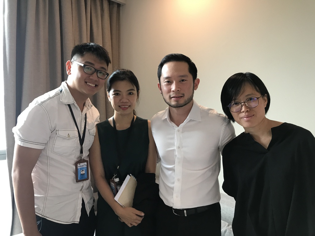 Chan Eu Boon pictured with a media team after a recorded interview.
